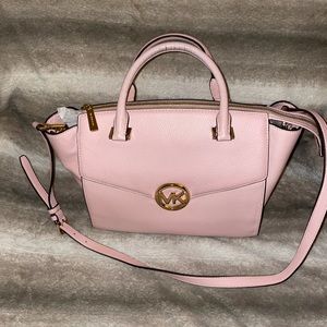 Beautifully kept pink MK purse. Carried maybe 5 plus times.